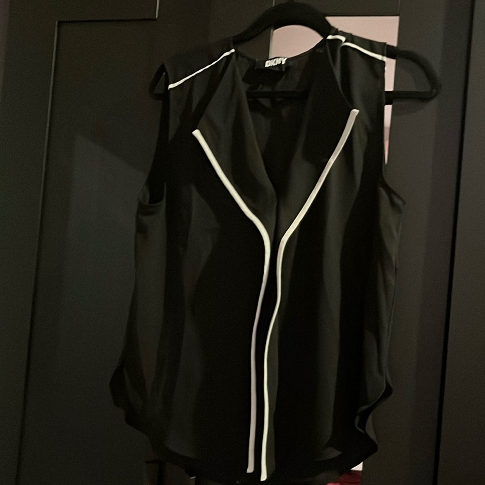 Sleeveless blouse. Perfect for summer, never worn.